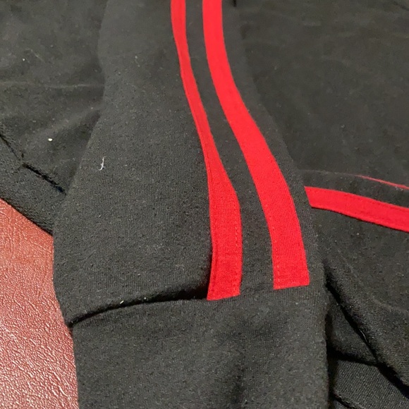 Red side stripped black women’s top. - Picture 3 of 3